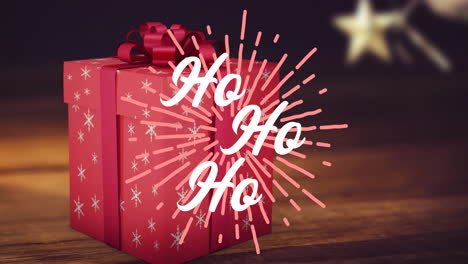 animation of hohoho text at christmas over present