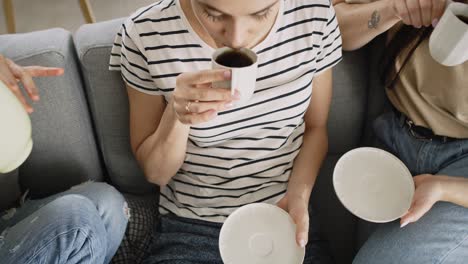 Top-view-video-of-coffee-time-in-the-living-room