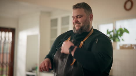 chef adjusting apron