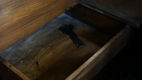 Opening-old-school-desk-with-ink-stain-inside