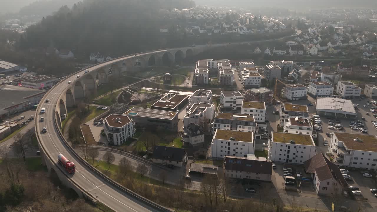 Aerial View of a Town with a Large Viaduct and Urban Landscape