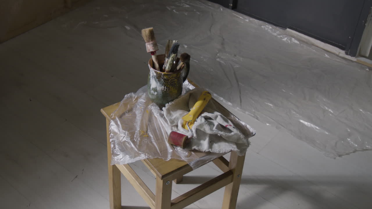 Painting supplies on a stool