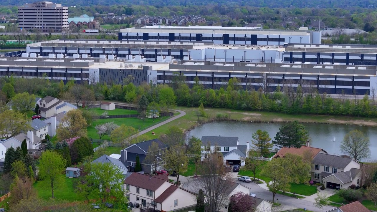 Aerial view of data center campus coexisting with residential area in Ohio, USA