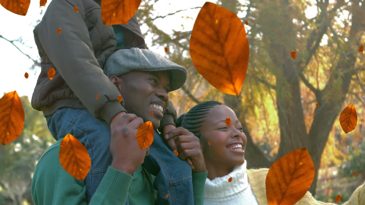 Animação de folhas de outono caindo sobre família afro-americana feliz no parque.