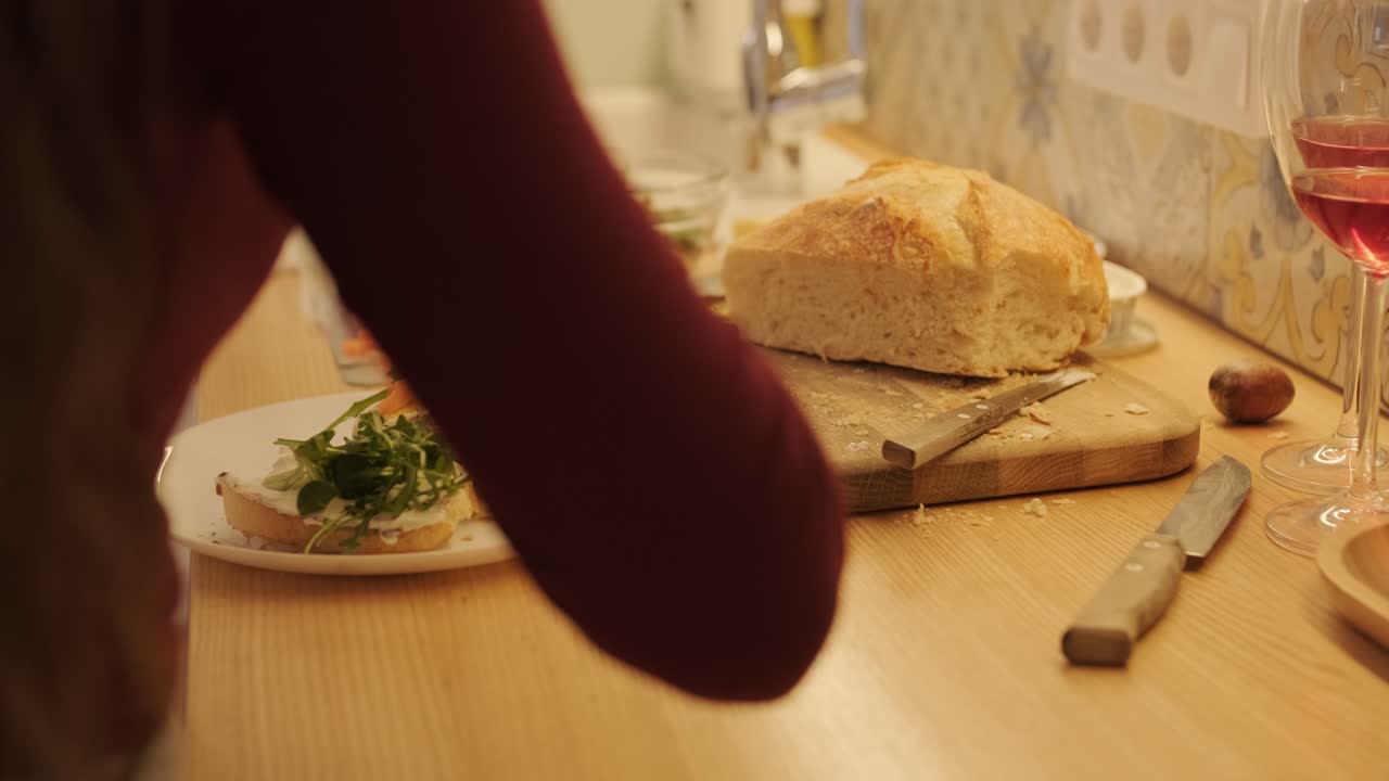 Loving Couple Making a Sandwich in Kitchen-Living Room