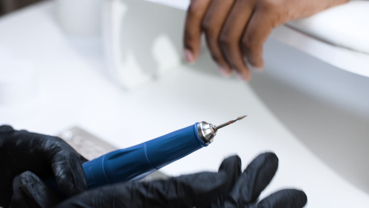 Manicure Procedure with Nail Drill