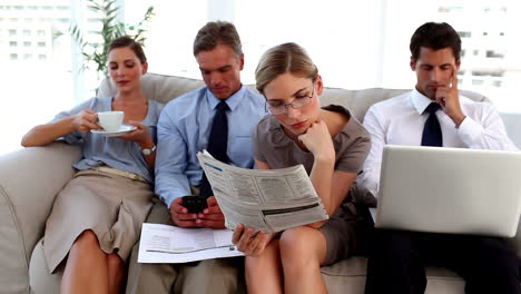 Business-people-sitting-on-a-couch