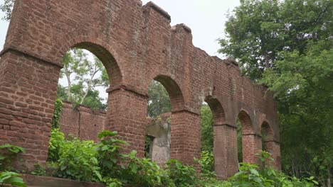 the nilakuti or indigo factory built during the british rule today lies in a dilapidated and abandoned state in the forest