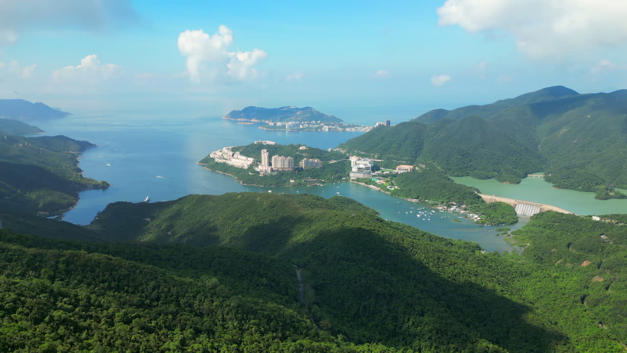 Lush Green Forests And Blue Water Of Tai Tam Bay Hong Kong Island China Drone Track Right 4K 60FPS