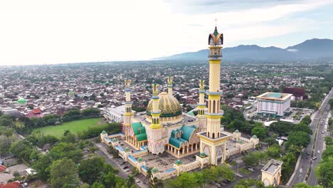 islamic center, great mosque mataram, lombok, indonesia. aerial crane of iconic religious building.