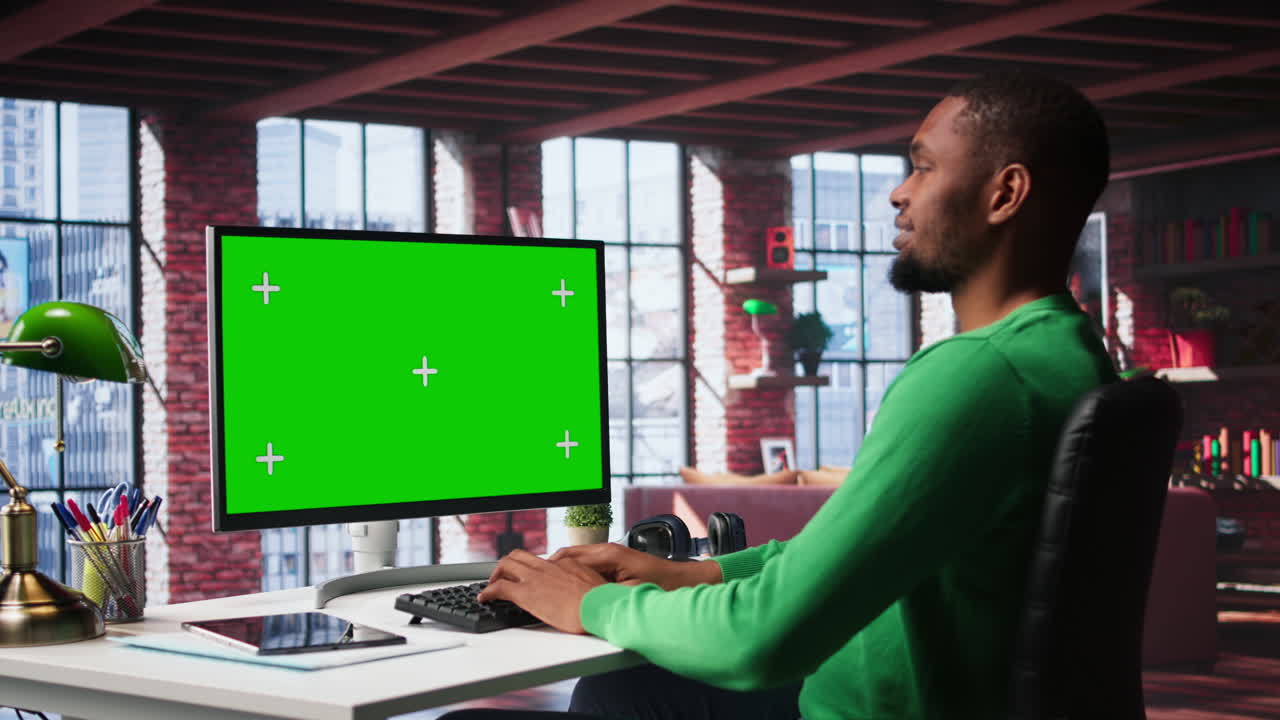 Man at home using mockup on pc preparing presentation slides