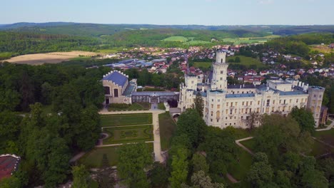 Gorgeous-aerial-top-view-flight-Hluboká-Nad-Vltavou-is-a-Fairy-tale-castle-in-Czech-Republic-Europe,-summer-day-2023