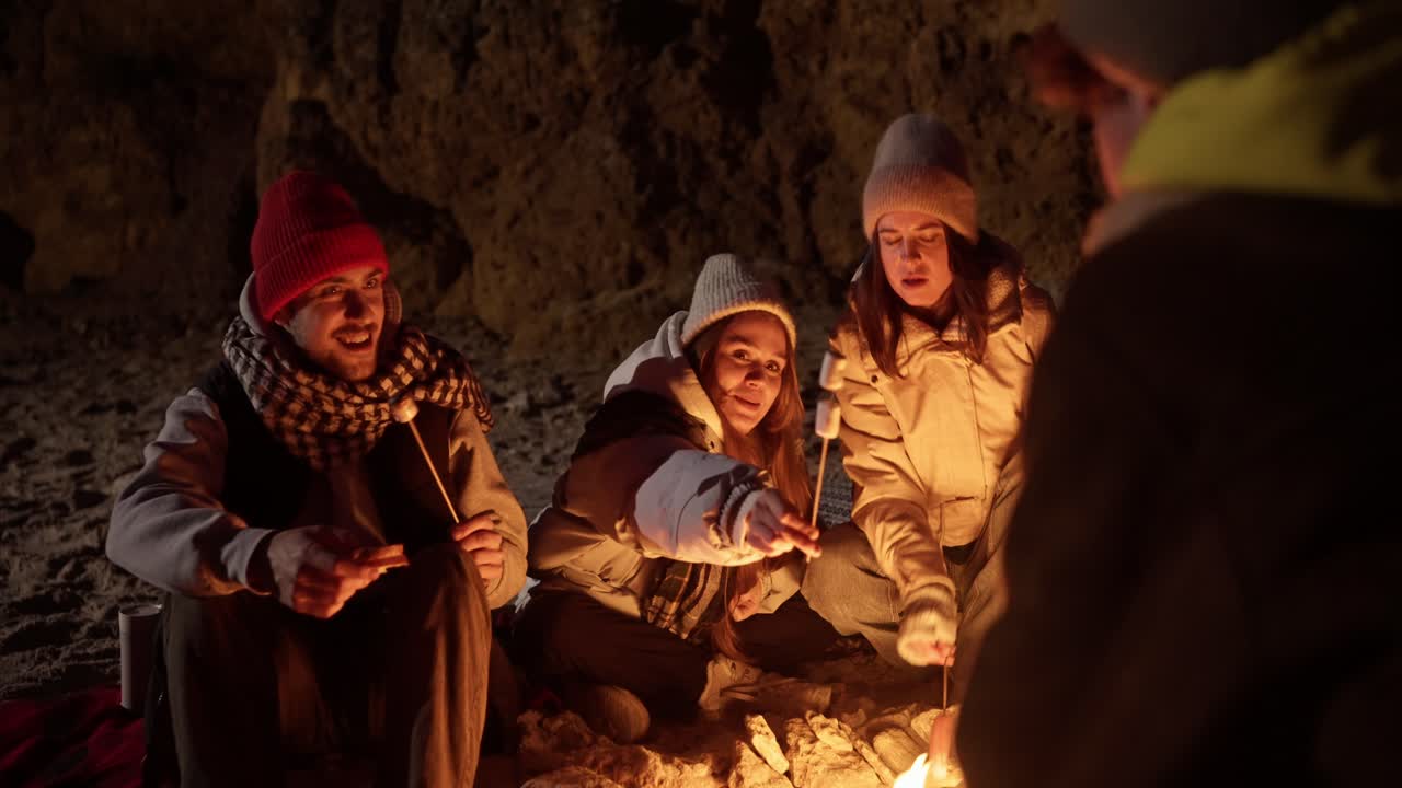 Friends Enjoying a Cozy Night by the Campfire
