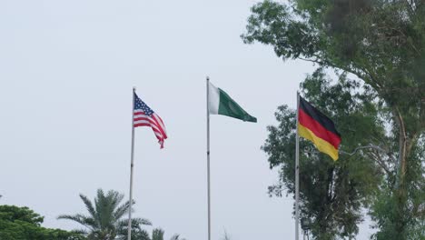 three national flags: usa, pakistan, and germany