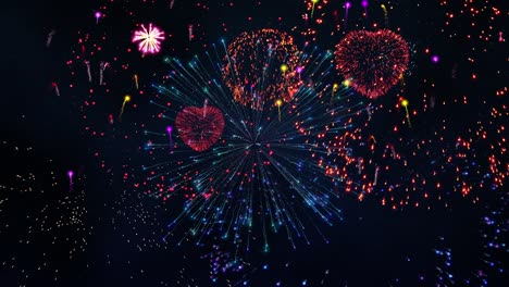 exhibición de fuegos artificiales masivos contra un cielo nocturno lleno de estrellas