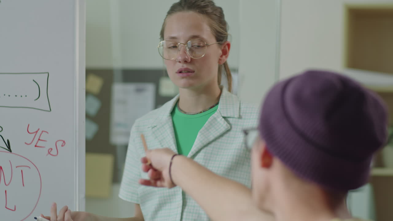 Girl Giving Presentation on Team Meeting in IT Company