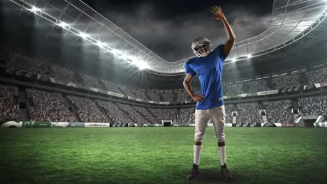 american football player waving at his fans