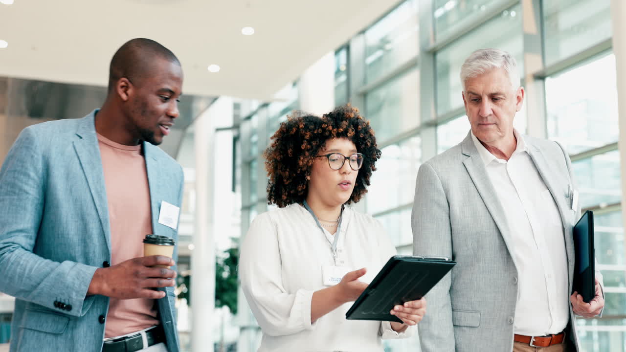 Tablet, diversity and walking business people