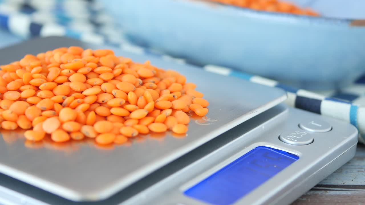 Weighing Red Lentils on a Food Scale