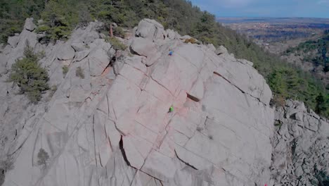 Rock-climbers-on-the-side-of-a-hill-in-Boulder-Colorado