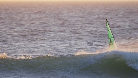 male surfer windsurfing in the beach 4k