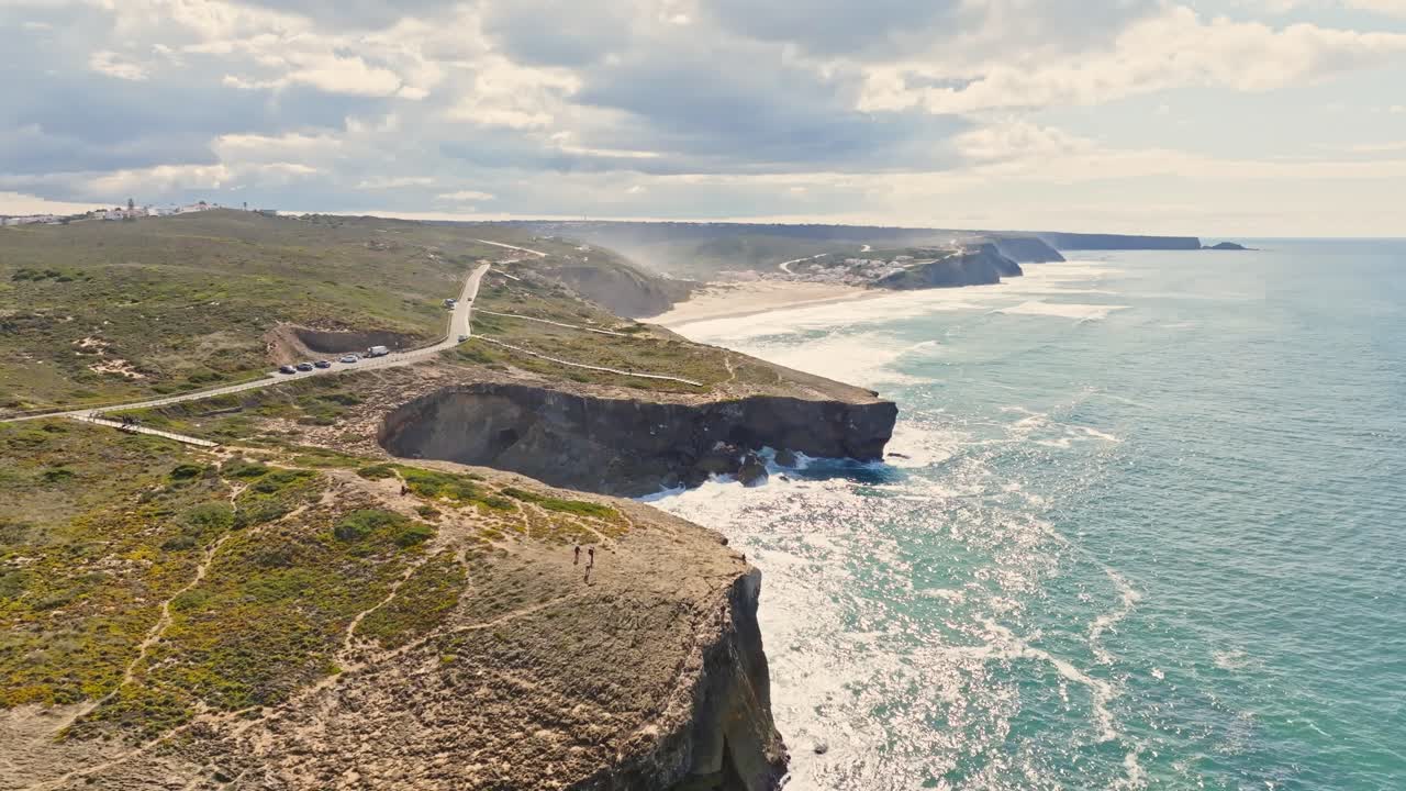 breathtaking beauty of Portugal's coastline as powerful ocean waves crash against the rugged, rocky shores