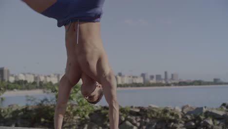 man exercising outdoors with a scenic city and bay view