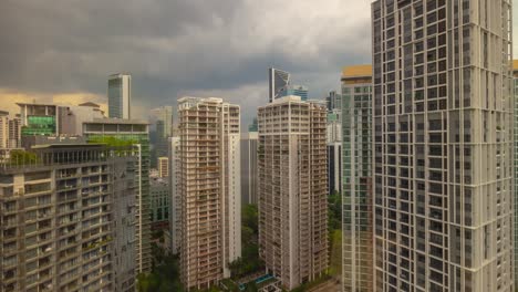 sunset time kuala lumpur city downtown apartment complex rooftop panorama 4k timelapse malaysia