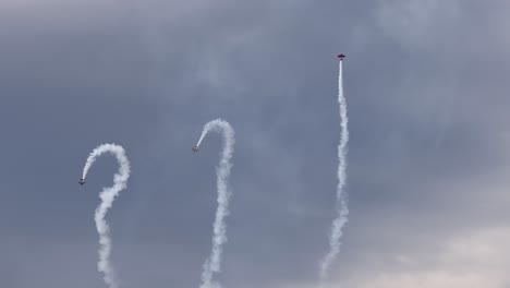 planes performing intricate maneuvers in the sky