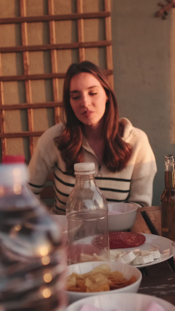 Woman eating food at a party