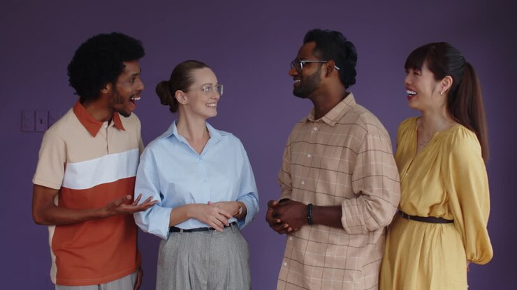 Portrait of Multiethnic Group of People against Purple Background