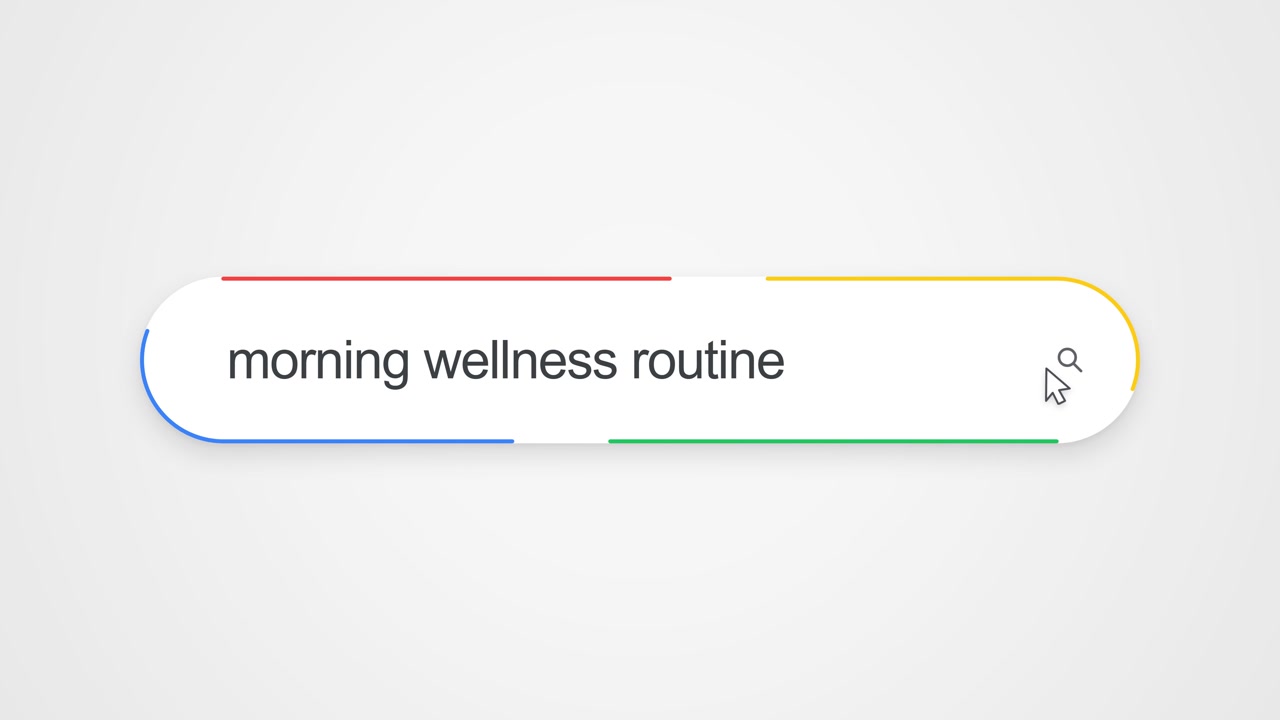 Close-up view of typing "morning wellness routine" into an online search bar with a cursor clicking the search icon, illustrating internet search and healthy lifestyle research