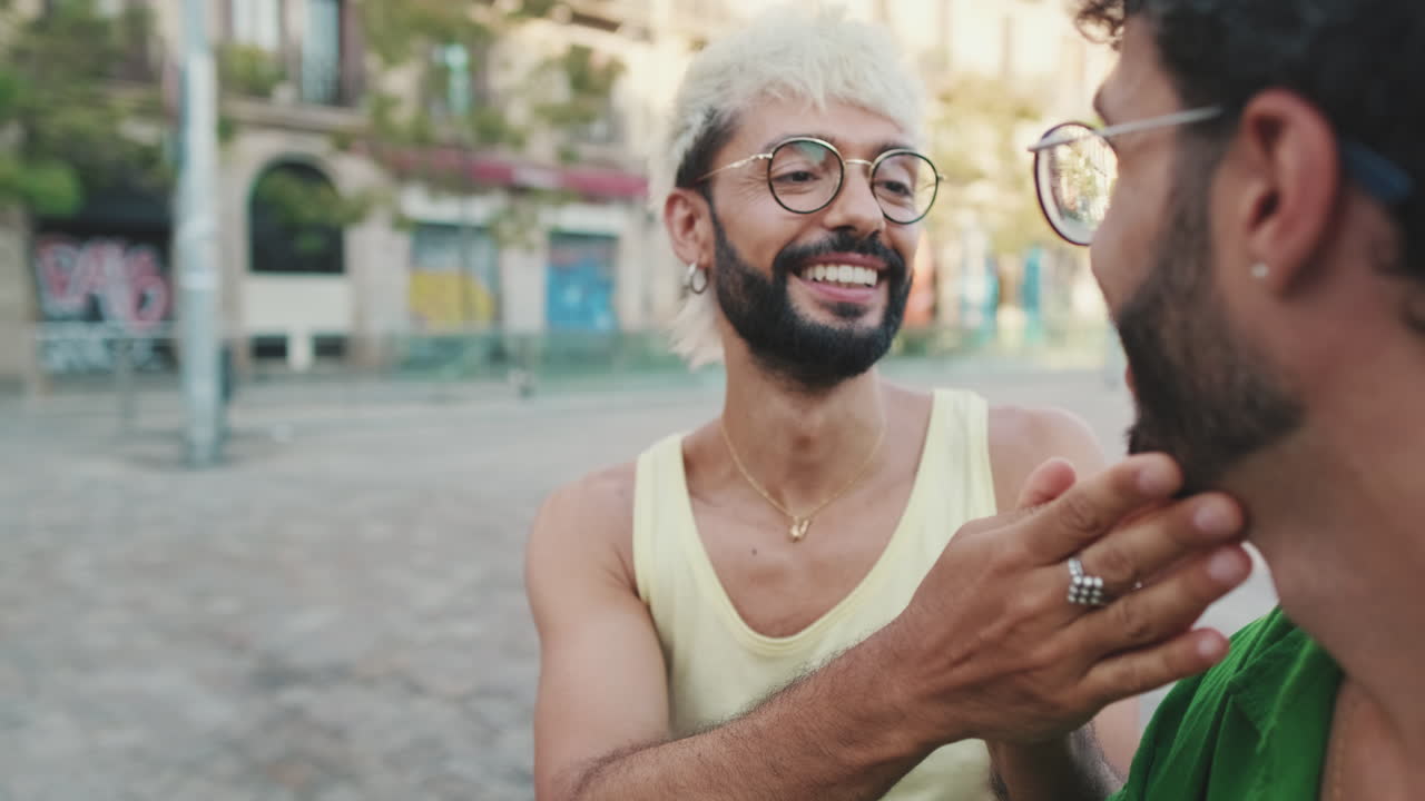 Affectionate Gay Couple Smiling and Interacting Outdoors