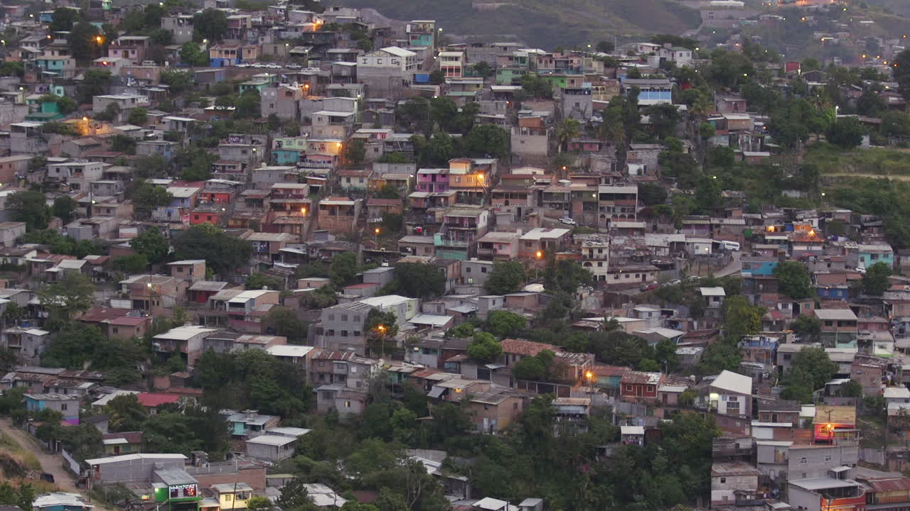 A residential neighborhood on the outskirts of Tegucigalpa, Honduras at sunrise