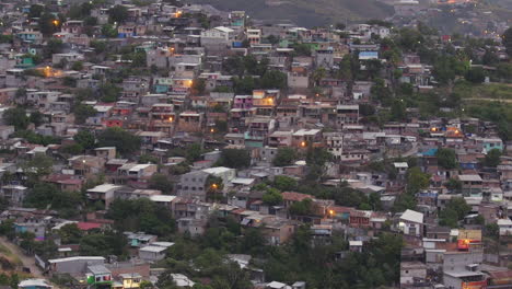 a residential neighborhood on the outskirts of tegucigalpa, honduras at sunrise