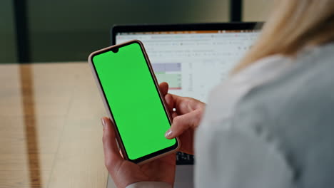 Closeup-mockup-cellphone-scrolling-woman-finger.-Manager-hand-holding-mobile