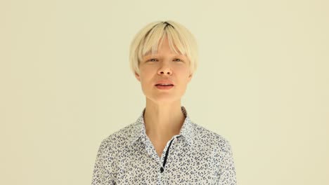 woman with short blonde hair showing different expressions
