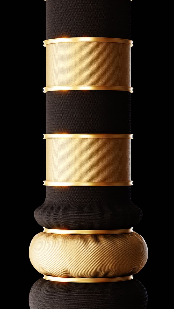 Vertical loop animation with golden and black textile and golden rings inflating on dark background