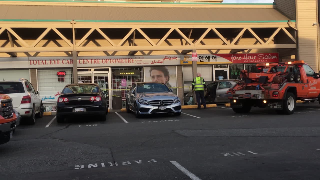 Motion of red and blue emergency lights of police cars and tow car on road for car accident scene with 4k resolution