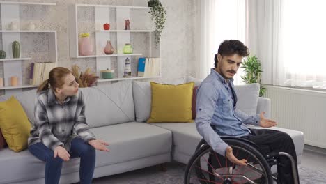 Disabled man and his girlfriend are fighting, arguing.