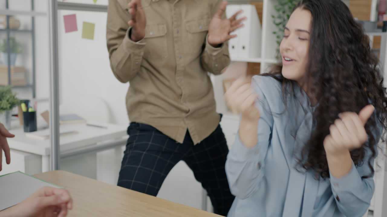 Team Celebrating in Office