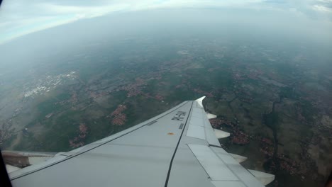 view from the aircraft window to the runway