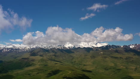 elbrus region. flying over a highland plateau. beautiful landscape of nature. mount elbrus is visible in the background.