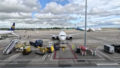 planes waiting for departure at dublin airport, ireland - static shot