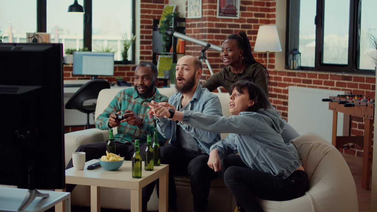 Happy friends celebrating video games win on tv console