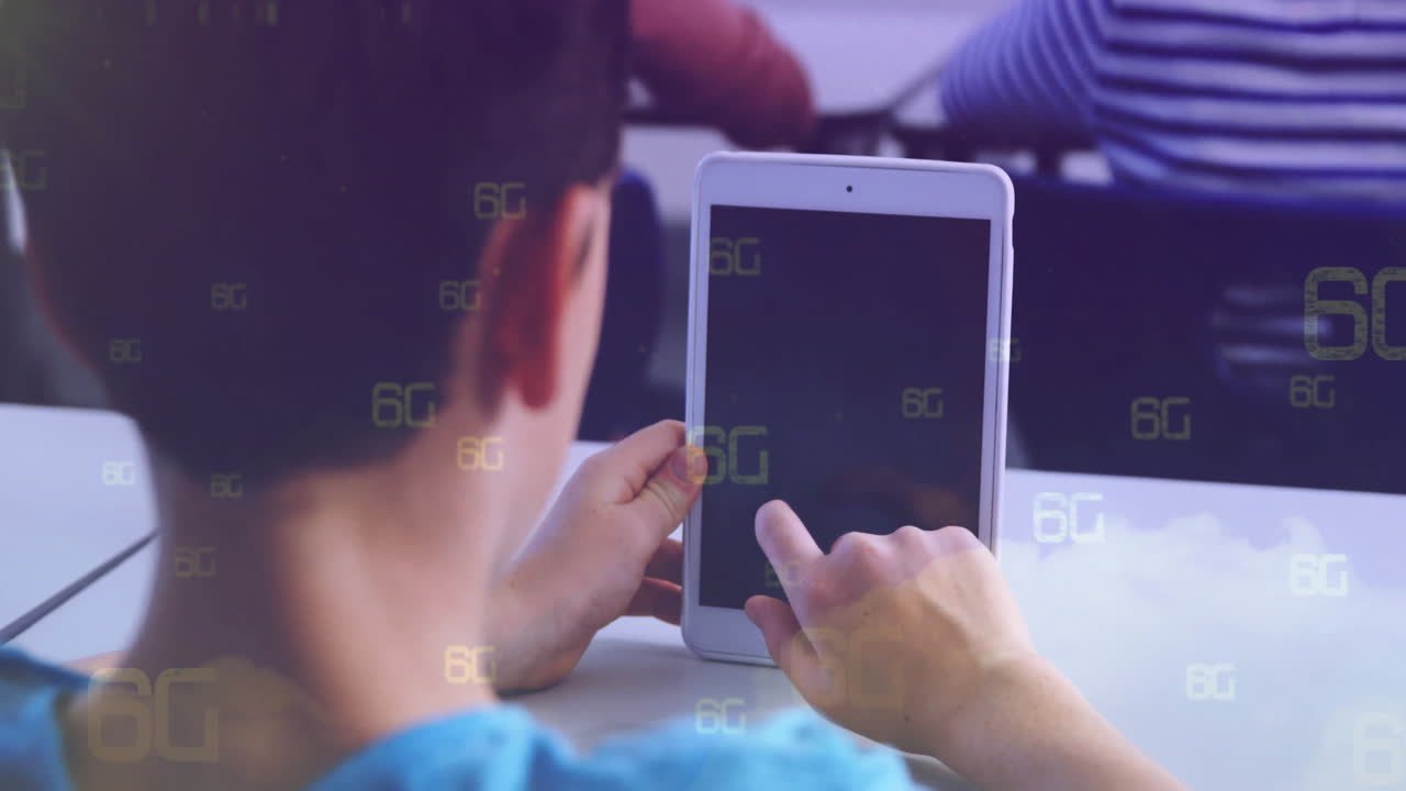 Boy tapping tablet in classroom, displaying floating 6G icons and education technology concept