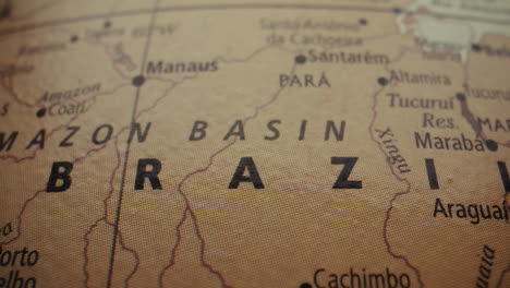 close-up of a world map focused on the amazon basin and brazil