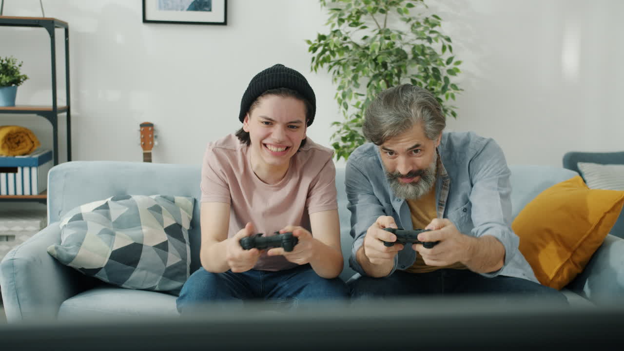 Father and Son Playing Video Games Together