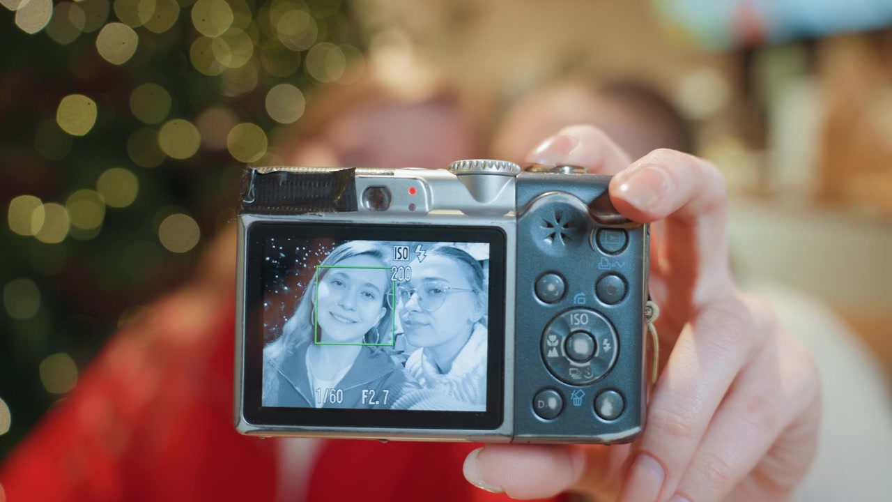 Close-up of Digital Camera Screen Showing Two Women Taking a Selfie