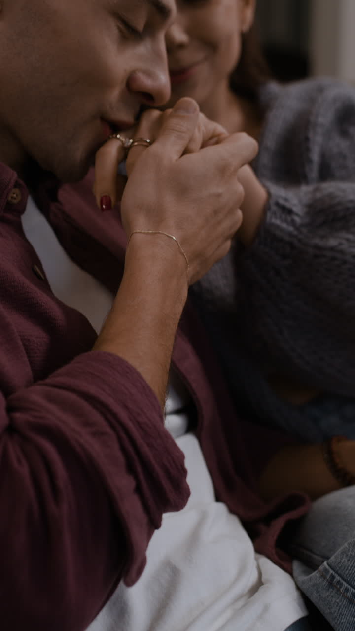 Couple Holding Hands and Cozying Up